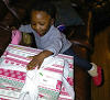 HACM child receives holiday gift